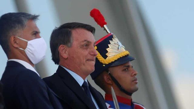 Bolsonaro threatens WHO exit as Covid-19 kills ‘a Brazilian per minute’