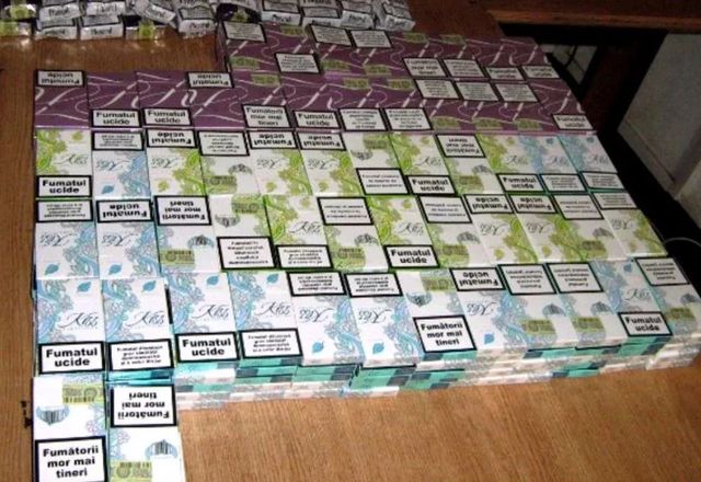 Peste 1,4 milioane de țigări de contrabandă, găsite de polițiști în urma unor percheziții făcute în București, Ilfov și Prahova