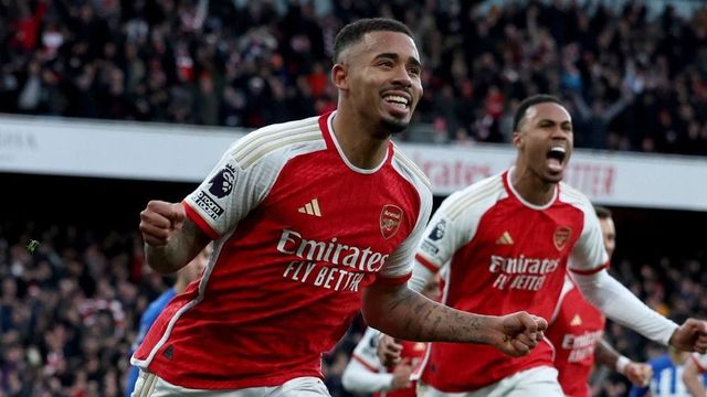 Soccer-Arsenal move top of Premier League with 2-0 win over Brighton
