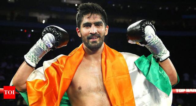 Boxer Vijender Singh wins 11th consecutive pro bout