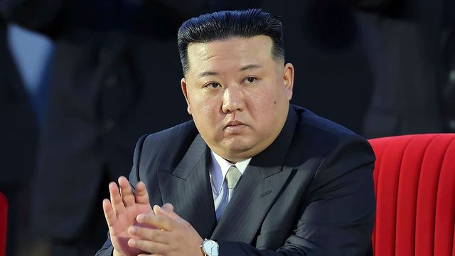 North Korea lashes out at critics, hints at more satellite launches