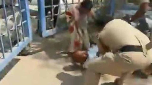 Telangana minister orders suspension of cop who kicked father of deceased teen