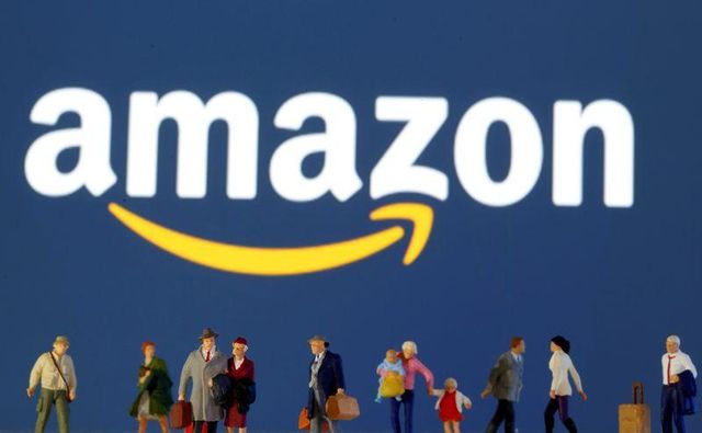 Amazon raises overtime pay for warehouse workers