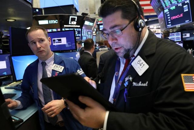 Wall Street drops after weak data, trade optimism fades