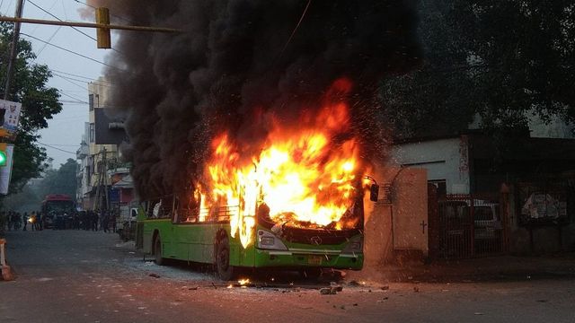 Buses torched as protesters clash with police in Delhi over citizenship law