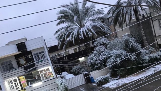 Orașul Bagdad, acoperit de zăpadă pentru prima dată în ultimul deceniu