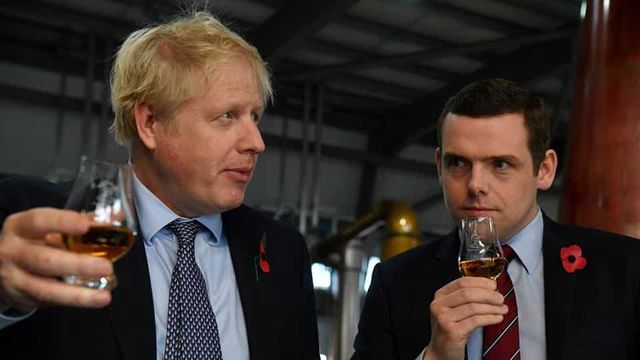 UK junior minister resigns over Boris Johnson adviser’s lockdown drive