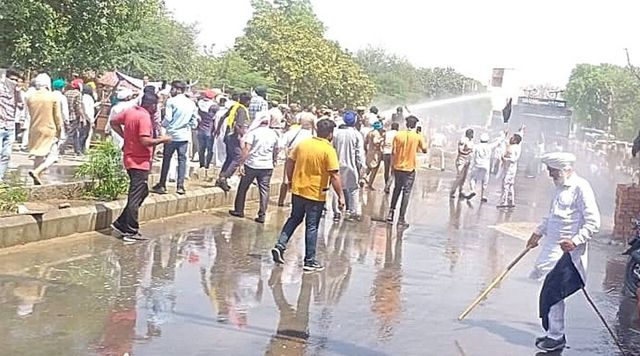 Police use water cannon to disperse protesting farmers in Sirsa