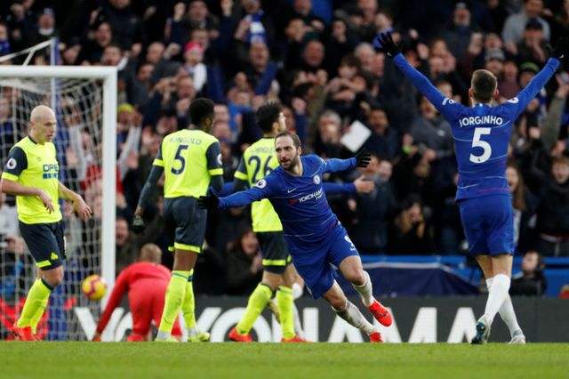 Higuain scores first goals as Chelsea bounce back from thrashing to rout Huddersfield