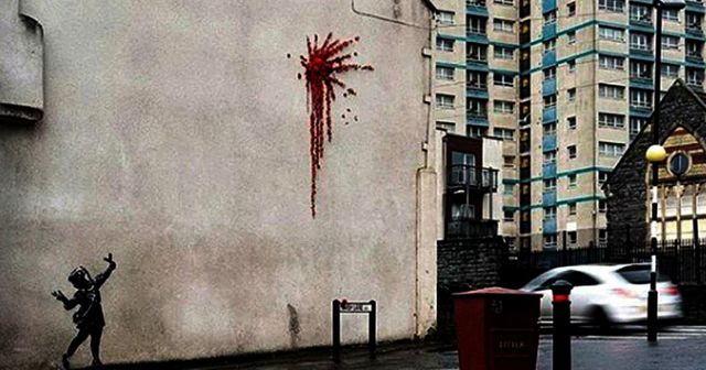 Scritte sul murale di Banksy di San Valentino