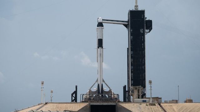 2 Nasa astronauts climb aboard SpaceX rocket for historic launch