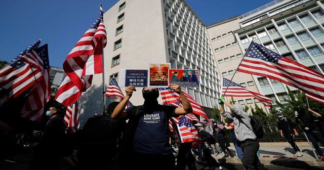 Hong Kong street protesters say ‘Thank you’ to Trump, wave American flags