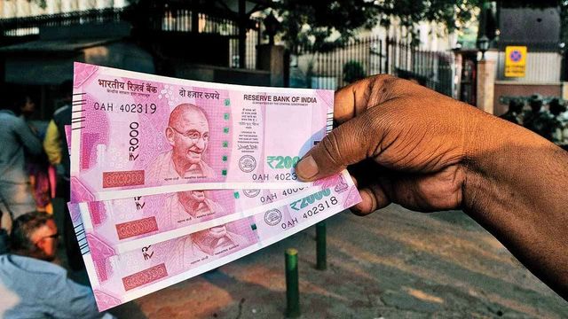 Rupee slips for third day, down 18 paise to 69.60 on sustained dollar demand, higher crude oil prices