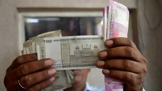 Rupee Fluctuates In Narrow Range Against Dollar