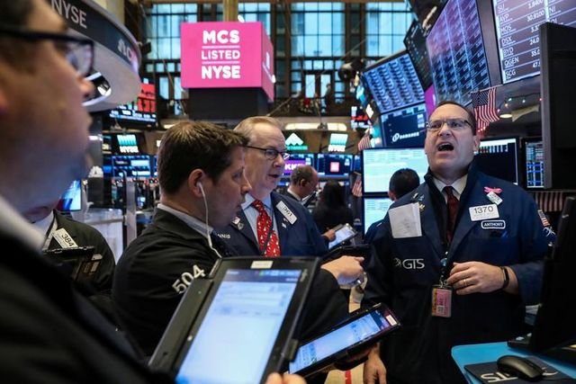 Wall Street tumbles on global growth worries, J&J decline