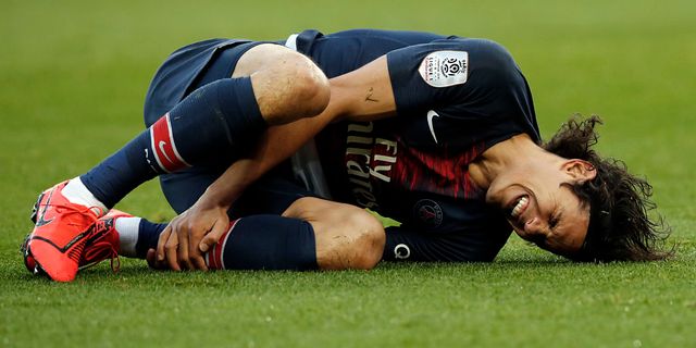 Paris Saint-Germain extend lead in Ligue 1 but Cavani injury hurts Champions League preparation