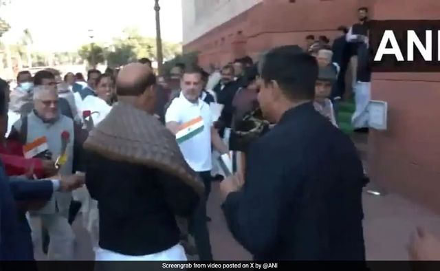 Rahul Gandhi Gives Rose, Tiranga To Rajnath Singh Amid Protests At Parliament