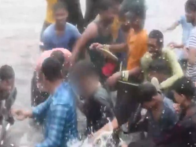 Woman on bike harassed, groped by mob on flooded road in Lucknow