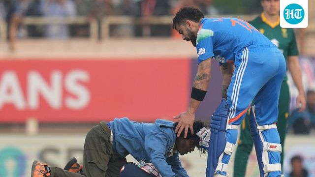 Virat Kohli fan evades security, falls at his feet interrupting hundred celebration