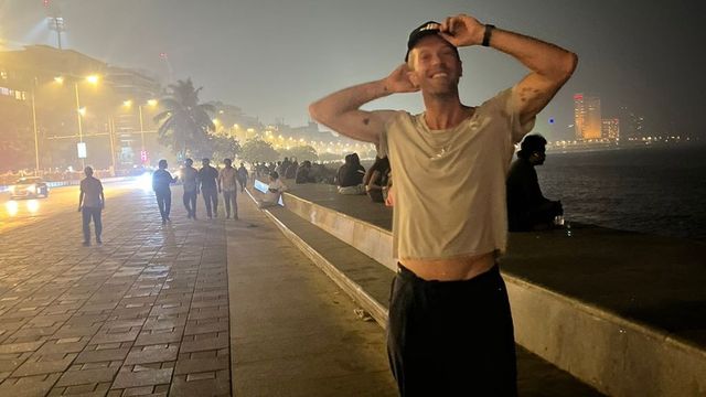 Coldplay’s Chris Martin arrives in Mumbai with partner Dakota Johnson ahead of India tour