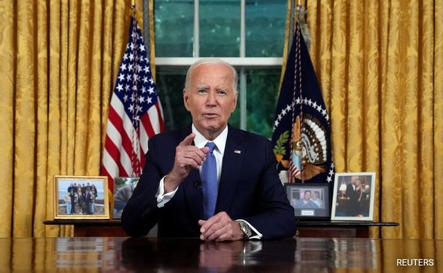 Biden smiles, salutes, but avoids question on ending White House race