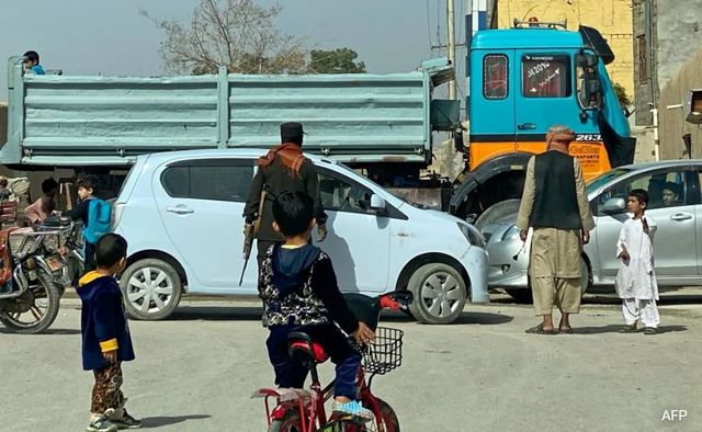 A suicide bomber attacks a bank in Afghanistan, killing at least 3 people and injuring 12 others