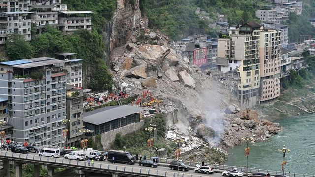 Chongqing landslide kills eight as 34 remain missing after homes buried