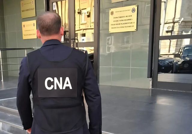 Motivele perchezițiilor de astăzi în privința a doi funcționari de la Protecția Consumatorilor