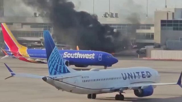 American Airlines Plane Catches Fire At Denver Airport