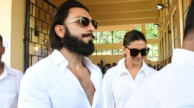 Deepika Padukone casts her vote, fans finally spot her baby bump as Ranveer Singh plays a caring husband