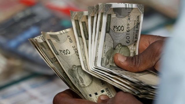 Indian Rupee Falls To Record Low, Breaches 93 Per Dollar