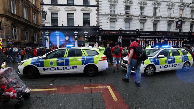 Driver arrested after car plows into celebrating Liverpool fans