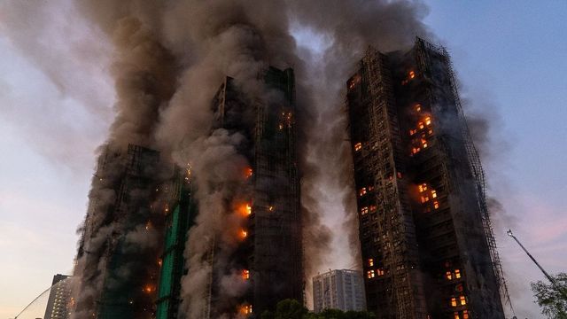 4 killed, dozens trapped after fire engulfs multiple high-rises in Hong Kong