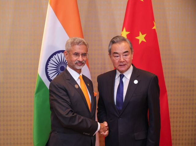 China's foreign minister meets Jaishankar, calls for resumption of direct flights