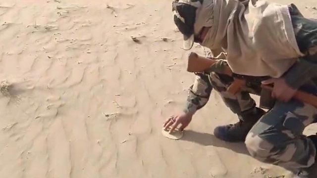 BSF jawan roasts 'papad' on sand in Bikaner amid intense heatwave