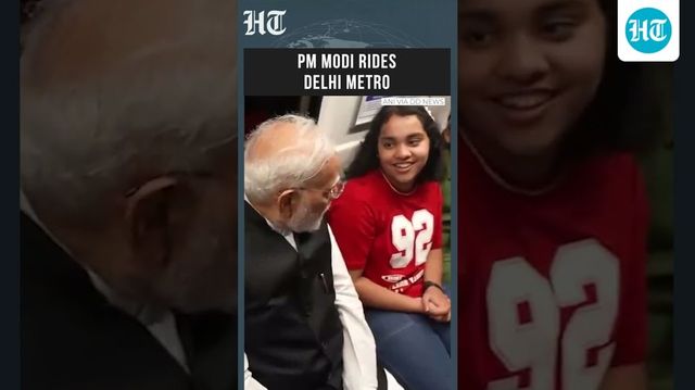 PM Modi takes Metro to Delhi University's SRCC, seen interacting with children