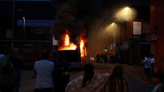 Violence Erupts In UK's Leeds As Rioters Torch Bus, Overturn Police Car