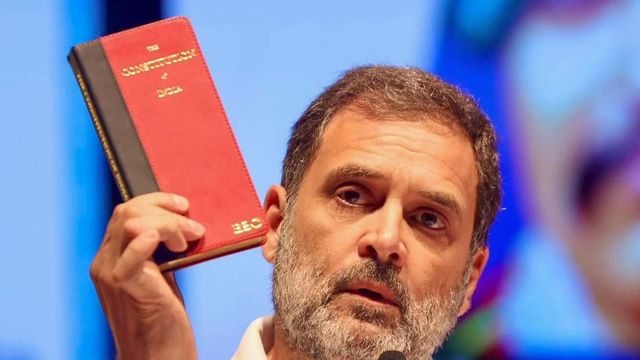 BJP, Congress trade barbs over 'red' Constitution carried by Rahul Gandhi