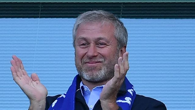 Britain freezes assets and imposes travel ban on Roman Abramovich, allows Chelsea to continue playing