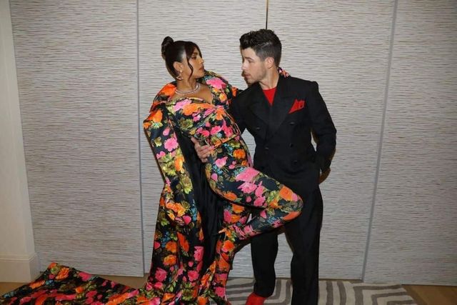 Priyanka Chopra strikes a sultry pose in head-to-toe floral-print attire with Nick Jonas at British Fashion Awards