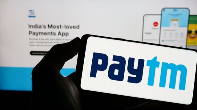 Paytm discontinues inter-company agreements with payments bank, shares gain