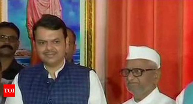 Maharashtra Chief Minister Devendra Fadnavis meets Anna Hazare as his indefinite fast enters seventh day